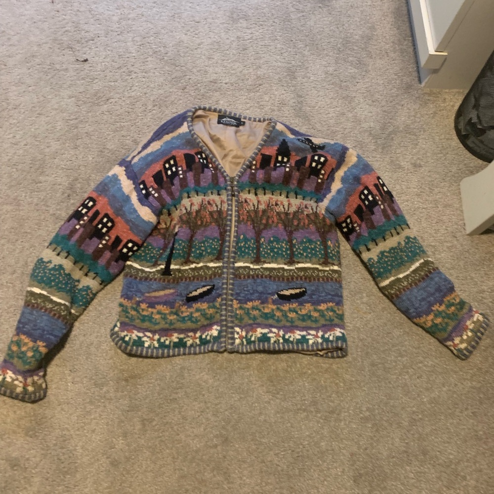 Multicoloured vintage women’s sweater with city landscape and nature design.